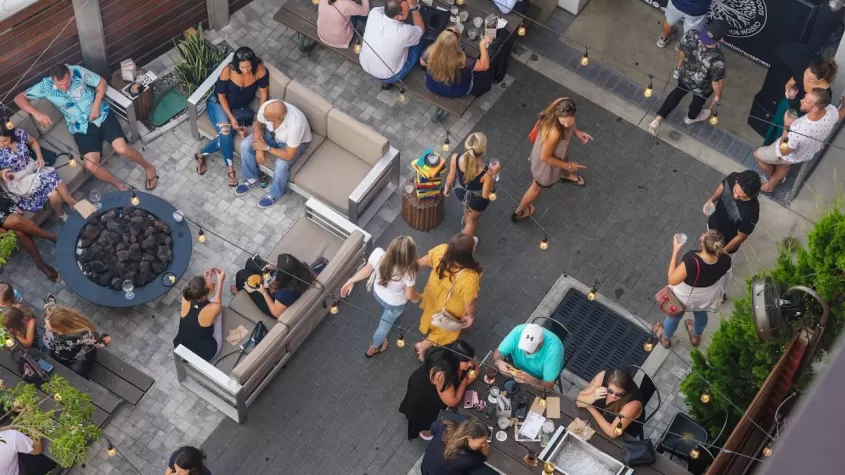 Group on patio at Social House