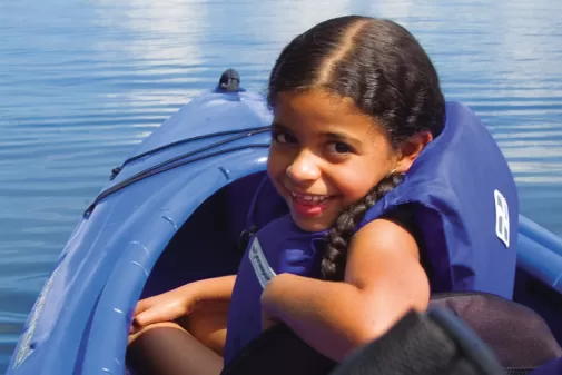 Kid kayaking for the first time