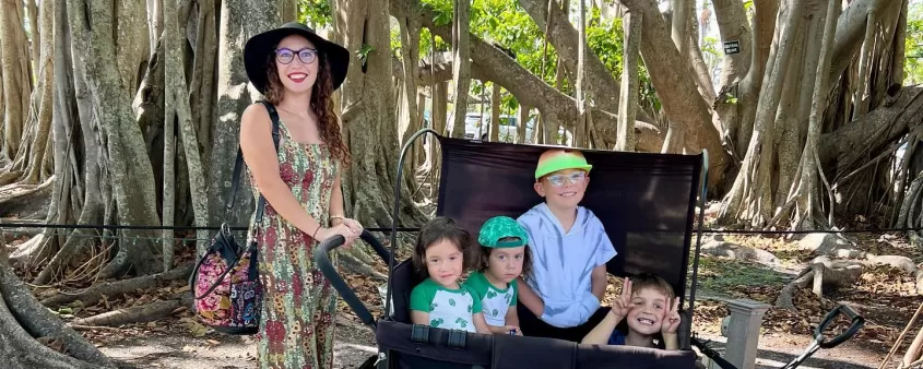 Family posing for photo at Edison and Ford Winter Estates